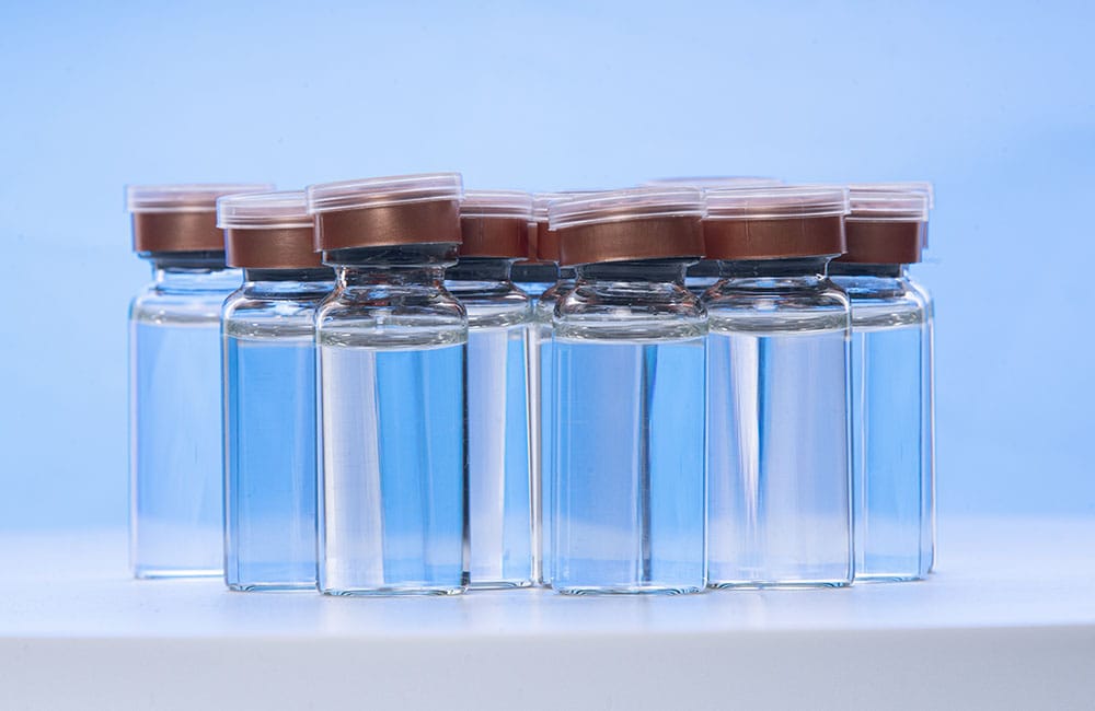 Untitled-3_0000_group-of-glass-vials-on-bluish-background-2025-02-09-22-34-32-utc