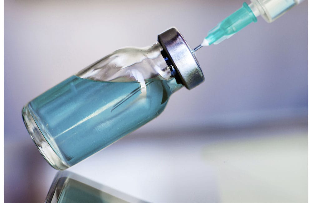 Untitled-3_0002_vial-filled-with-liquid-vaccine-in-medical-lab-wit-2025-02-12-05-38-31-utc